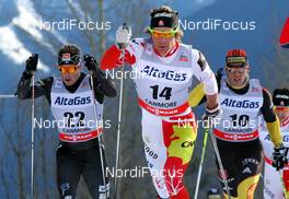 13.12.2012, Canmore, Canada (CAN):  (l-r) Kris Freeman (USA), Fischer, Swix, Alpina, Rottefella, Devon Kershaw (CAN), Fischer, Swix, Salomon, One Way and Jens Filbrich (GER), Rossignol, One Way, Rottefella, Adidas - FIS world cup cross-country, mass men, Canmore (CAN). www.nordicfocus.com. © Roycroft/NordicFocus. Every downloaded picture is fee-liable.