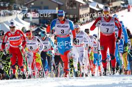 13.12.2012, Canmore, Canada (CAN):  (l-r) Martin Johnsrud Sundby (NOR), Fischer, KV+, Rottefella, Swix, Evgeniy Belov (RUS), Fischer, Swix, Alpina, Rottefella, Adidas and Chris Andre Jespersen (NOR), Rossignol, Start, Rottefella, Skigo - FIS world cup cross-country, mass men, Canmore (CAN). www.nordicfocus.com. © Roycroft/NordicFocus. Every downloaded picture is fee-liable.