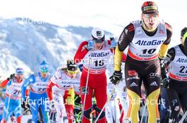 13.12.2012, Canmore, Canada (CAN):  Jens Filbrich (GER), Rossignol, One Way, Rottefella, Adidas followed by Eldar Roenning (NOR), Rossignol, Swix, Rottefella - FIS world cup cross-country, mass men, Canmore (CAN). www.nordicfocus.com. © Roycroft/NordicFocus. Every downloaded picture is fee-liable.