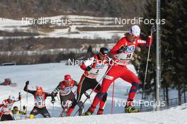 05.02.2012, Val di Fiemme, Italy (ITA): Mikko Kokslien (NOR), Fischer, Rottefella, Swix leads Bernhard Gruber (AUT), Fischer, Rottefella and Bill Demong (USA), Atomic, Swix - FIS world cup nordic combined, individual gundersen HS134/10km, Val di Fiemme (ITA). www.nordicfocus.com. © Manzoni/NordicFocus. Every downloaded picture is fee-liable.