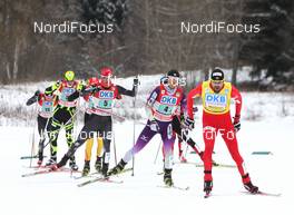 04.02.2012, Val di Fiemme, Italy (ITA): Magnus Moan (NOR), Madshus, Rottefella leads Akito Watabe (JPN), Fischer, Rottefella and Bill Demong (USA), Atomic, Swix - FIS world cup nordic combined, team HS134/2x7.5km, Val di Fiemme (ITA). www.nordicfocus.com. © Manzoni/NordicFocus. Every downloaded picture is fee-liable.