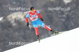 04.02.2012, Val di Fiemme, Italy (ITA): Sergej Maslennikov (RUS), Fischer, Rottefella - FIS world cup nordic combined, team HS134/2x7.5km, Val di Fiemme (ITA). www.nordicfocus.com. © Manzoni/NordicFocus. Every downloaded picture is fee-liable.
