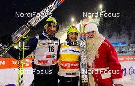 01.12.2012, Kuusamo, Finland (FIN):  (l-r) Sebastian Lacroix (FRA), Atomic, Salomon, One Way and Jason Lamy Chappuis (FRA), Salomon, Swix, One Way and the Santa Claus - FIS world cup nordic combined, individual gundersen HS142/10km, Kuusamo (FIN). www.nordicfocus.com. © Laiho/NordicFocus. Every downloaded picture is fee-liable.