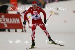 15.12.2012, Ramsau, Austria (AUT):  Tomasz Pochwala (POL), Fischer, Leki, Craft - FIS world cup nordic combined, individual gundersen HS98/10km, Ramsau (AUT). www.nordicfocus.com. © Laiho/NordicFocus. Every downloaded picture is fee-liable.