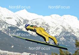 04.01.2012, Innsbruck, Austria (AUT): Denis Kornilov (RUS), Fischer - FIS world cup ski jumping, four hills tournament, individual HS130, Innsbruck (AUT). www.nordicfocus.com. © Felgenhauer/NordicFocus. Every downloaded picture is fee-liable.