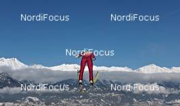 04.01.2012, Innsbruck, Austria (AUT): skijumper flying over Innsbruck - FIS world cup ski jumping, four hills tournament, individual HS130, Innsbruck (AUT). www.nordicfocus.com. © Felgenhauer/NordicFocus. Every downloaded picture is fee-liable.