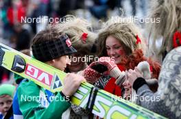11.03.2012, Oslo, Norway (NOR): Vegard Sklett (NOR), Fischer  and his fans - FIS world cup ski jumping, individual HS134, Oslo (NOR). www.nordicfocus.com.Â© Laiho/NordicFocus. Every downloaded picture is fee-liable.