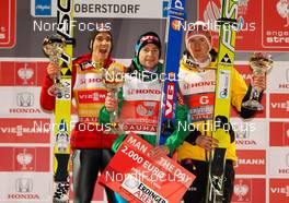 30.12.2012, Oberstdorf, Germany (GER): (l-r) Gregor Schlierenzauer (AUT), Fischer, Anders Jacobsen (NOR), Fluege.de and Severin Freund (GER), Fischer  - FIS world cup ski jumping, four hills tournament, individual HS137, Oberstdorf (GER). www.nordicfocus.com. © Laiho/NordicFocus. Every downloaded picture is fee-liable.