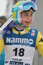 09.03.2012, Oslo, Norway (NOR): Elena Runggaldier (ITA), Fluege.de  - FIS world cup ski jumping ladies, individual HS106, Oslo (NOR). www.nordicfocus.com. © Hemmersbach/NordicFocus. Every downloaded picture is fee-liable.