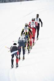 21.01.2012, Lienz, Austria (AUT): a chasing group closely together in the downhill - Worldloppet Dolomitenlauf Classic Race, Lienz (AUT). www.nordicfocus.com. © Felgenhauer/NordicFocus. Every downloaded picture is fee-liable.
