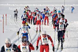 21.01.2012, Lienz, Austria (AUT): a long row of racers - Worldloppet Dolomitenlauf Classic Race, Lienz (AUT). www.nordicfocus.com. © Felgenhauer/NordicFocus. Every downloaded picture is fee-liable.