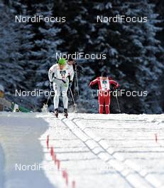 21.01.2012, Lienz, Austria (AUT): l-r: Jerry Ahrlin (SWE), Madshus, Team Xtra personell, Stanislav Rezac (CZE), Swix, Madshus, Martin Sutter (AUT), Fischer, Skinfit on the last meters before finish - Worldloppet Dolomitenlauf Classic Race, Lienz (AUT). www.nordicfocus.com. © Felgenhauer/NordicFocus. Every downloaded picture is fee-liable.