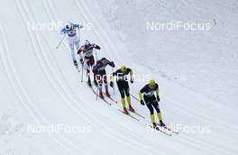29.01.2012, Val di Fassa / Val di Fiemme , Italy (ITA): helicopter view, chasing group, in front Joergen Brink (SWE), Madshus, Swix, Rottefella, United Bakeries, behind Petter Northug (NOR), Fischer, Rottefella, Alpina, Ski Go, Swix, United Bakeries     - FIS Marathon Cup Marcialonga, Val di Fassa / Val di Fiemme (ITA). www.nordicfocus.com. © Hemmersbach/NordicFocus. Every downloaded picture is fee-liable.