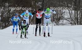 19.02.2012, Tartu, Estonia (EST): (l-r) Anders Hoegberg (SWE) and Jerry Ahrlin (SWE), Team Extra Personell, Madshus, Swix  followed by Stanislav Rezac (CZE), Madshus, Swix - FIS Marathon Cup Tartumarathon, Tartu (EST). www.nordicfocus.com. Â© Laiho/NordicFocus. Every downloaded picture is fee-liable.