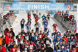 17.03.2012, Rena, Norway (NOR): lots of skiers finishing  - FIS Marathon Cup Birkebeinerrennet, Rena (NOR). www.nordicfocus.com.© Laiho/NordicFocus. Every downloaded picture is fee-liable.
