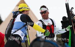 17.03.2012, Rena, Norway (NOR):  (l-r) Anders Soedergren (SWE), Team United Bakeries, Fischer, One Way, Salomon congratulates the winner Anders Aukland (NOR), Team X-tra personell, Atomic, KV+ - FIS Marathon Cup Birkebeinerrennet, Rena (NOR). www.nordicfocus.com.© Laiho/NordicFocus. Every downloaded picture is fee-liable.