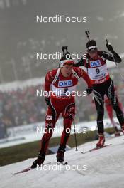 06.01.2013, Oberhof, Germany (GER): Emil Hegle Svendsen (NOR), Madshus, Rottefella, Swix, Odlo,Benjamin Weger (SUI), Atomic, Alpina, Swix, Oakley, Toko, ODLO - IBU world cup biathlon, pursuit men, Oberhof (GER). www.nordicfocus.com. © Manzoni/NordicFocus. Every downloaded picture is fee-liable.