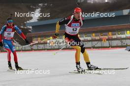 06.01.2013, Oberhof, Germany (GER): Arnd Peiffer (GER), Fischer, Salomon, OneWay, adidas, Evgeny Ustyugov (RUS), Fischer, Rottefella, Swix, adidas - IBU world cup biathlon, pursuit men, Oberhof (GER). www.nordicfocus.com. © Manzoni/NordicFocus. Every downloaded picture is fee-liable.