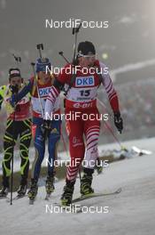 06.01.2013, Oberhof, Germany (GER): Simon Eder (AUT), Fischer, Rottefella, Swix, Fredrik Lindstroem (SWE), Fischer, Rottefella, Swix, adidas, Martin Fourcade (FRA), Rossignol, Rottefella, OneWay - IBU world cup biathlon, pursuit men, Oberhof (GER). www.nordicfocus.com. © Manzoni/NordicFocus. Every downloaded picture is fee-liable.