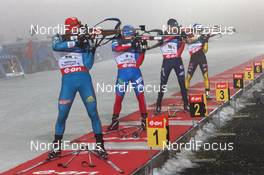 04.01.2013, Oberhof, Germany (GER): Serguei Sednev (UKR), Rossignol, Rottefella, Swix, Evgeniy Garanichev (RUS), Madshus, Rottefella, Swix, adidas, Tim Burke (USA), Rossignol, Rottefella, OneWay, adidas, Eric Lesser (GER), Salomon, Swix, adidas - IBU world cup biathlon, relay men, Oberhof (GER). www.nordicfocus.com. © Manzoni/NordicFocus. Every downloaded picture is fee-liable.