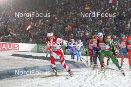 03.01.2013, Oberhof, Germany (GER): Krystyna Palka (POL), Fischer, Rottefella, Swix leads Liudmila Kalinchik (BLR), Fischer, Rottefella and Elisabeth Hoegberg (SWE), Fischer, Rottefella, Leki, adidas - IBU world cup biathlon, relay women, Oberhof (GER). www.nordicfocus.com. © Manzoni/NordicFocus. Every downloaded picture is fee-liable.