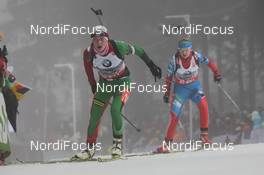 05.01.2013, Oberhof, Germany (GER): Darya Domracheva (BLR), Fischer, Rottefella, Leki, Ekaterina Glazyrina (RUS), Fischer, Rottefella, Alpina, Swix, adidas - IBU world cup biathlon, sprint women, Oberhof (GER). www.nordicfocus.com. © Manzoni/NordicFocus. Every downloaded picture is fee-liable.