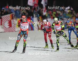 10.01.2013, Ruhpolding, Germany (GER): Michal Slesingr (CZE), Rossignol, Rottefella, Leki, Simon Fourcade (FRA), Fischer, Rottefella, Rossignol, Swix, - IBU world cup biathlon, relay men, Ruhpolding (GER). www.nordicfocus.com. © Manzoni/NordicFocus. Every downloaded picture is fee-liable.