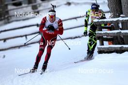 19.01.2013, Antholz, Italy (ITA): Emil Hegle Svendsen (NOR), Madshus, Rottefella, Swix, Odlo, Martin Fourcade (FRA), Rossignol, Rottefella, OneWay, Toko - IBU world cup biathlon, pursuit men, Antholz (ITA). www.nordicfocus.com. © Manzoni/NordicFocus. Every downloaded picture is fee-liable.