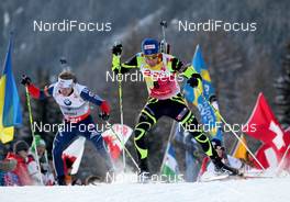 19.01.2013, Antholz, Italy (ITA): Martin Fourcade (FRA), Rossignol, Rottefella, OneWay, Toko, Lowell Bailey (USA), Rossignol, Rottefella, One Way - IBU world cup biathlon, pursuit men, Antholz (ITA). www.nordicfocus.com. © Manzoni/NordicFocus. Every downloaded picture is fee-liable.