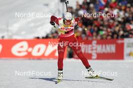 19.01.2013, Antholz, Italy (ITA): Tora Berger (NOR), Fischer, Rottefella, Odlo - IBU world cup biathlon, pursuit women, Antholz (ITA). www.nordicfocus.com. © Manzoni/NordicFocus. Every downloaded picture is fee-liable.