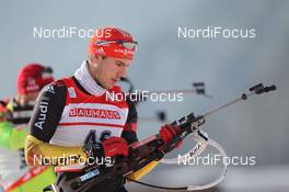 18.01.2013, Antholz, Italy (ITA): Arnd Peiffer (GER), Fischer, Salomon, OneWay, adidas - IBU world cup biathlon, sprint men, Antholz (ITA). www.nordicfocus.com. © Manzoni/NordicFocus. Every downloaded picture is fee-liable.