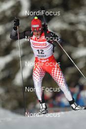 18.01.2013, Antholz, Italy (ITA): Scott Perras (CAN), Salomon, Swix - IBU world cup biathlon, sprint men, Antholz (ITA). www.nordicfocus.com. © Manzoni/NordicFocus. Every downloaded picture is fee-liable.
