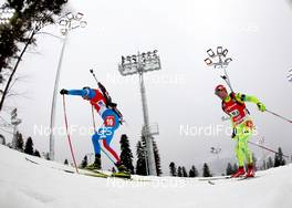 10.03.2013, Sochi, Russia (RUS): Dominik Windisch (ITA), Fischer, Rottefella, Leki, Jakov Fak (SLO), Fischer, Rottefella, Alpina, Swix - IBU world cup biathlon, relay men, Sochi (RUS). www.nordicfocus.com. © Manzoni/NordicFocus. Every downloaded picture is fee-liable.