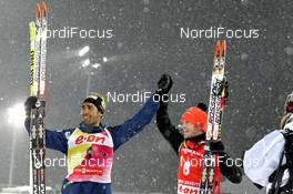 16.03.2013, Khanty-Mansiysk, Russia (RUS): Martin Fourcade (FRA), Rossignol, Rottefella, OneWay, Toko, Michal Slesingr (CZE), Rossignol, Rottefella, Leki - IBU world cup biathlon, pursuit men, Khanty-Mansiysk (RUS). www.nordicfocus.com. © Manzoni/NordicFocus. Every downloaded picture is fee-liable.