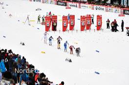 16.02.2013, Davos, Switzerland (SUI): a group of women passes Buenda ski stadium - FIS world cup cross-country, individual sprint, Davos (SUI). www.nordicfocus.com. © Felgenhauer/NordicFocus. Every downloaded picture is fee-liable.