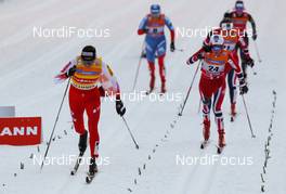 13.03.2013, Drammen, Norway (NOR): (l-r) Justyna Kowalczyk (POL), Fischer, Swix, Rottefella and Heidi Weng (NOR), Madshus, Swix, Alpina, Rottefella - FIS world cup cross-country, individual sprint, Drammen (NOR). www.nordicfocus.com. © Laiho/NordicFocus. Every downloaded picture is fee-liable.
