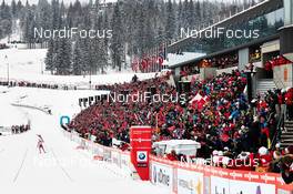 17.03.2013, Oslo, Norway (NOR): Therese Johaug (NOR) passes Holmenkollen ski stadium - FIS world cup cross-country, mass women, Oslo (NOR). www.nordicfocus.com. © Felgenhauer/NordicFocus. Every downloaded picture is fee-liable.