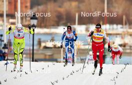 20.03.2013, Stockholm, Sweden (SWE): Katja Visnar (SLO), Kerttu Niskanen (FIN), Justyna Kowalczyk (POL), (l-r) - FIS world cup cross-country, individual sprint, Stockholm (SWE). www.nordicfocus.com. © Felgenhauer/NordicFocus. Every downloaded picture is fee-liable.