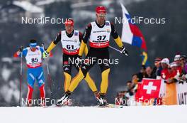 27.02.2013, Val di Fiemme, Italy (ITA): Axel Teichmann (GER), Madshus, Swix, Rottefella, Adidas followed by Hannes Dotzler (GER), Fischer, Swix, Alpina, Rottefella, Adidas  - FIS nordic world ski championships, cross-country, 15km men, Val di Fiemme (ITA). www.nordicfocus.com. © Laiho/NordicFocus. Every downloaded picture is fee-liable.