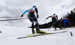 27.02.2013, Val di Fiemme, Italy (ITA):  (l-r) Nikolay Chebotko (KAZ), Fischer, Swix, Rottefella, Erik Bjornsen (USA), Fischer, Swix, Rottefella and Paul Constantin Pepene (ROU) - FIS nordic world ski championships, cross-country, 15km men, Val di Fiemme (ITA). www.nordicfocus.com. © Laiho/NordicFocus. Every downloaded picture is fee-liable.