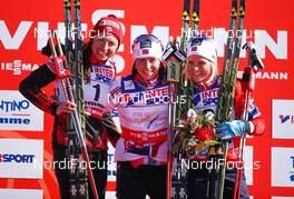 02.03.2013, Val di Fiemme, Italy (ITA): (l-r) Justyna Kowalczyk (POL), Fischer, Swix, Rottefella, Marit Bjoergen (NOR), Fischer, Swix, Rottefella and Therese Johaug (NOR), Fischer, Swix, Salomon - FIS nordic world ski championships, cross-country, mass women, Val di Fiemme (ITA). www.nordicfocus.com. © Laiho/NordicFocus. Every downloaded picture is fee-liable.