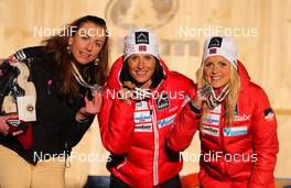 02.03.2013, Val di Fiemme, Italy (ITA): (l-r) Justyna Kowalczyk (POL), Fischer, Swix, Rottefella, Marit Bjoergen (NOR), Fischer, Swix, Rottefella and Therese Johaug (NOR), Fischer, Swix, Salomon - FIS nordic world ski championships, cross-country, mass women, Val di Fiemme (ITA). www.nordicfocus.com. © Laiho/NordicFocus. Every downloaded picture is fee-liable.