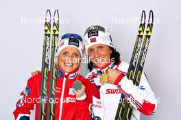 23.02.2013, Val di Fiemme, Italy (ITA): l-r: Therese Johaug (NOR), Marit Bjoergen (NOR) - FIS nordic world ski championships, cross-country, medals, Val di Fiemme (ITA). www.nordicfocus.com. © Felgenhauer/NordicFocus. Every downloaded picture is fee-liable.