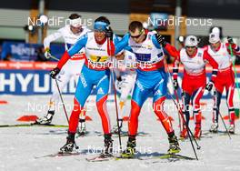 01.03.2013, Val di Fiemme, Italy (ITA): (l-r) Alexander Legkov (RUS), Rossignol, Swix, Rottefella, Adidas and Sergey Ustiugov (RUS), Fischer, Swix Adidas - FIS nordic world ski championships, cross-country, 4x10km men, Val di Fiemme (ITA). www.nordicfocus.com. © Laiho/NordicFocus. Every downloaded picture is fee-liable.