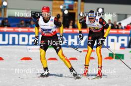 01.03.2013, Val di Fiemme, Italy (ITA): (l-r) Axel Teichmann (GER), Madshus, Swix, Rottefella, Adidas and Tim Tscharnke (GER), Fischer, Swix, Alpina, Rottefella, Adidas - FIS nordic world ski championships, cross-country, 4x10km men, Val di Fiemme (ITA). www.nordicfocus.com. © Laiho/NordicFocus. Every downloaded picture is fee-liable.