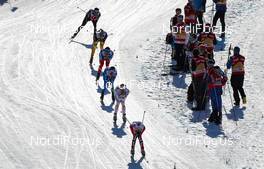 01.03.2013, Val di Fiemme, Italy (ITA): skiers passing a coaching zone - FIS nordic world ski championships, cross-country, 4x10km men, Val di Fiemme (ITA). www.nordicfocus.com. © Laiho/NordicFocus. Every downloaded picture is fee-liable.