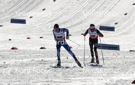 01.03.2013, Val di Fiemme, Italy (ITA): (l-r) Matti Heikkinen (FIN), Salomon, One Way, Craft and Tad Elliott (USA), Salomon, Swix - FIS nordic world ski championships, cross-country, 4x10km men, Val di Fiemme (ITA). www.nordicfocus.com. © Laiho/NordicFocus. Every downloaded picture is fee-liable.
