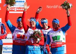 01.03.2013, Val di Fiemme, Italy (ITA): (l-r) Evgeniy Belov (RUS), Fischer, Swix, Alpina, Rottefella, Adidas, Alexander Legkov (RUS), Rossignol, Swix, Rottefella, Adidas, Sergey Ustiugov (RUS), Fischer, Swix Adidas, Maxim Vylegzhanin (RUS), Fischer, Swix, Alpina, Rottefella, Adidas - FIS nordic world ski championships, cross-country, 4x10km men, Val di Fiemme (ITA). www.nordicfocus.com. © Laiho/NordicFocus. Every downloaded picture is fee-liable.