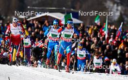 01.03.2013, Val di Fiemme, Italy (ITA): l-r: Eldar Roenning (NOR), Giorgio Di Centa (ITA), Maxim Vylegzhanin (RUS) - FIS nordic world ski championships, cross-country, 4x10km men, Val di Fiemme (ITA). www.nordicfocus.com. © Felgenhauer/NordicFocus. Every downloaded picture is fee-liable.