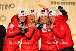 01.03.2013, Val di Fiemme, Italy (ITA): (l-r) Heidi Weng (NOR), Madshus, Swix, Alpina, Rottefella, Therese Johaug (NOR), Fischer, Swix, Salomon, Kristin Steira (NOR), Madshus, One Way, Salomon, Swix and Marit Bjoergen (NOR), Fischer, Swix, Rottefella  - FIS nordic world ski championships, cross-country, 4x5km women, Val di Fiemme (ITA). www.nordicfocus.com. © Laiho/NordicFocus. Every downloaded picture is fee-liable.